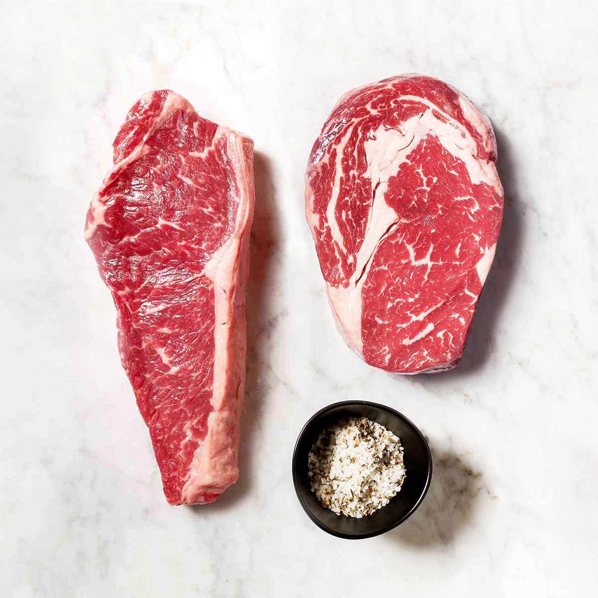 Two Raw Steaks