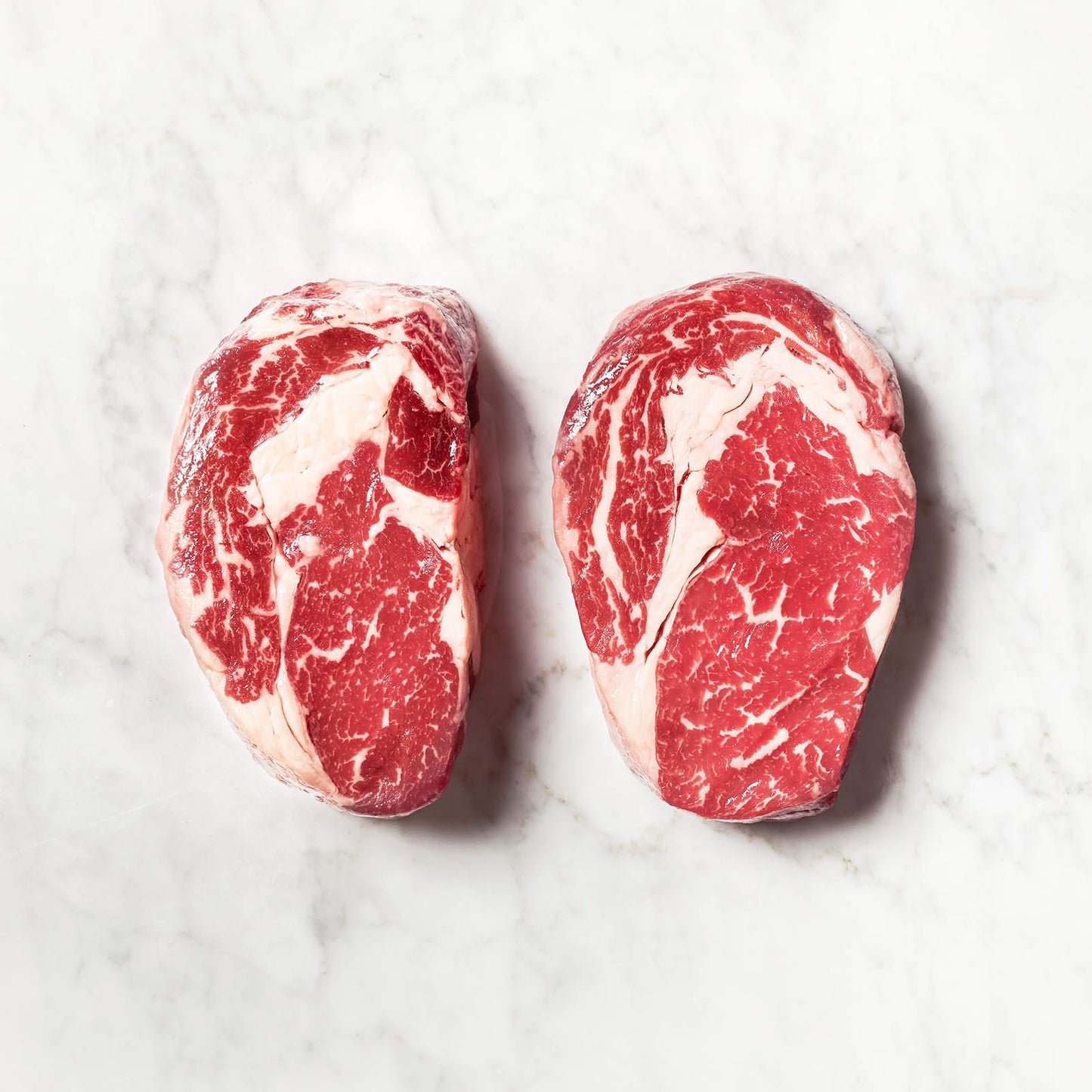 Two Raw Ribeyes